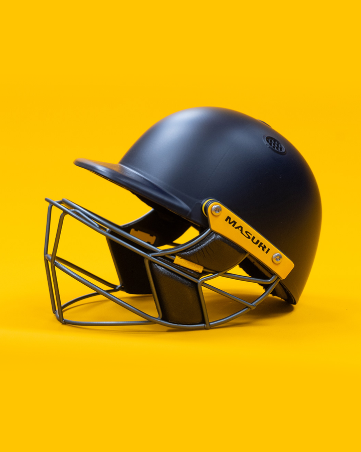 Masuri E Line Player Steel senior cricket batting helmet in painted navy, side profile showing the steel Eye-Line grille and matte finish