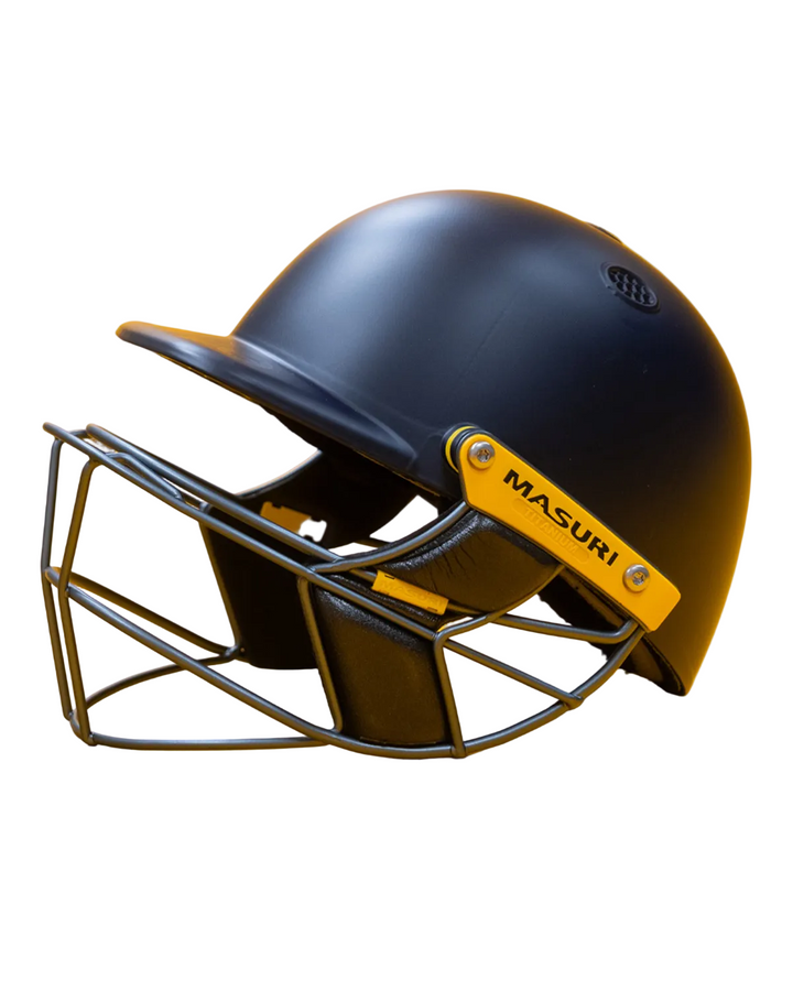 Masuri E Line Player Titanium cricket batting helmet in navy, side profile showing the titanium grille, fitted with StemGuard Lite 2.0 neck protection